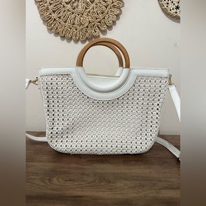 Francesca’s white woven tote bag